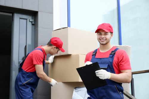 Office relocation team transporting workplace items safely in Barnet