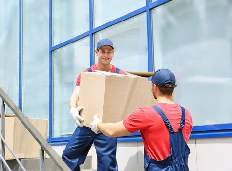 Furniture pick-up service removing a sofa in Barnet