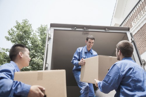 Household furniture being carefully moved from a Barnet property