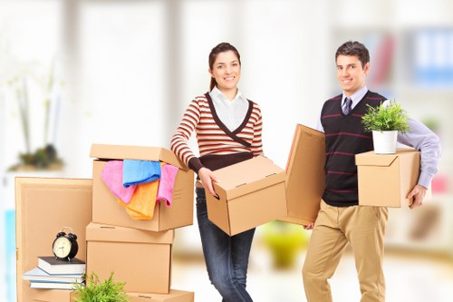 Packed boxes and furniture loaded for a removal truck hire job
