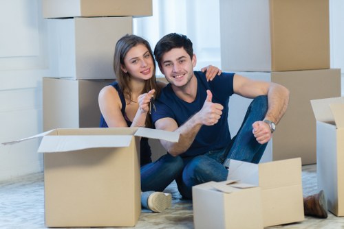 Unpacking boxes and arranging items in a new Barnet property
