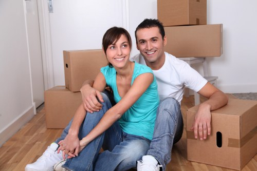 Local Barnet moving service loading household items into a van