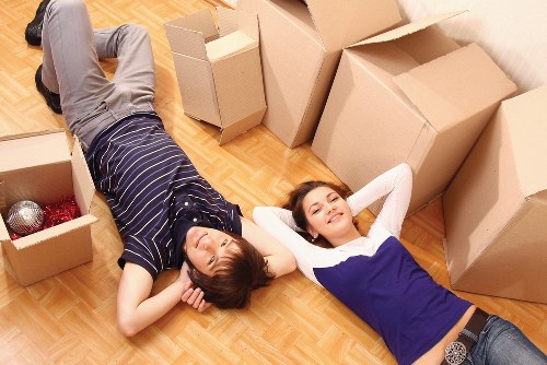 Careful piano transport through a residential property in Barnet