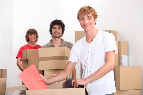 Packing and loading belongings into a removals van