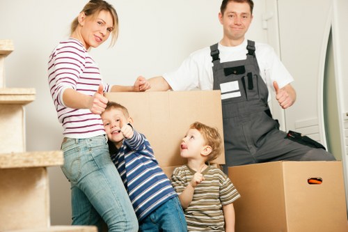 Packed moving boxes and organised belongings ready for relocation in Barnet